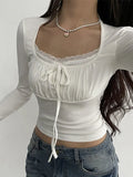 vintage long-sleeved shirt with lace trim and