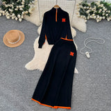 Simple Wind Bumpy Striped Knitted Sister Set With Long-Sleeved Sweater + High Waist Long Body Skirt
