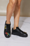 Robbin Make A Statement Applique Detail