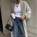 Autumn And Winter Hot Sweater Suit Women Loose Long Version Imitation Cardigan + Open Fork