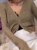 glitter knit top with pearl buttons and