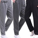 Men Solid Color Pocket Loose Harem Pants Running Yoga Sports Sweatpants Trousers Sweatpants Elastic Loose Trousers