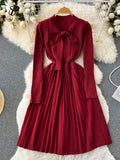 2022 Winter Knitted Pleated Dress Temperamant Bow Tie Long Sleeve Elastic Slim Female Solid Midi Long Sweater