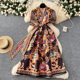 A Women's Court Style V Tie With A Belt Net Yarn Bubble Sleeve Print Large Swing Long Joint