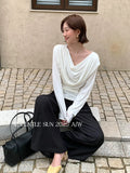 Does Not Return] Xiu Xixi 2025 Autumn Swing Bottom Knitted Long-Sleeved T-Shirt Top